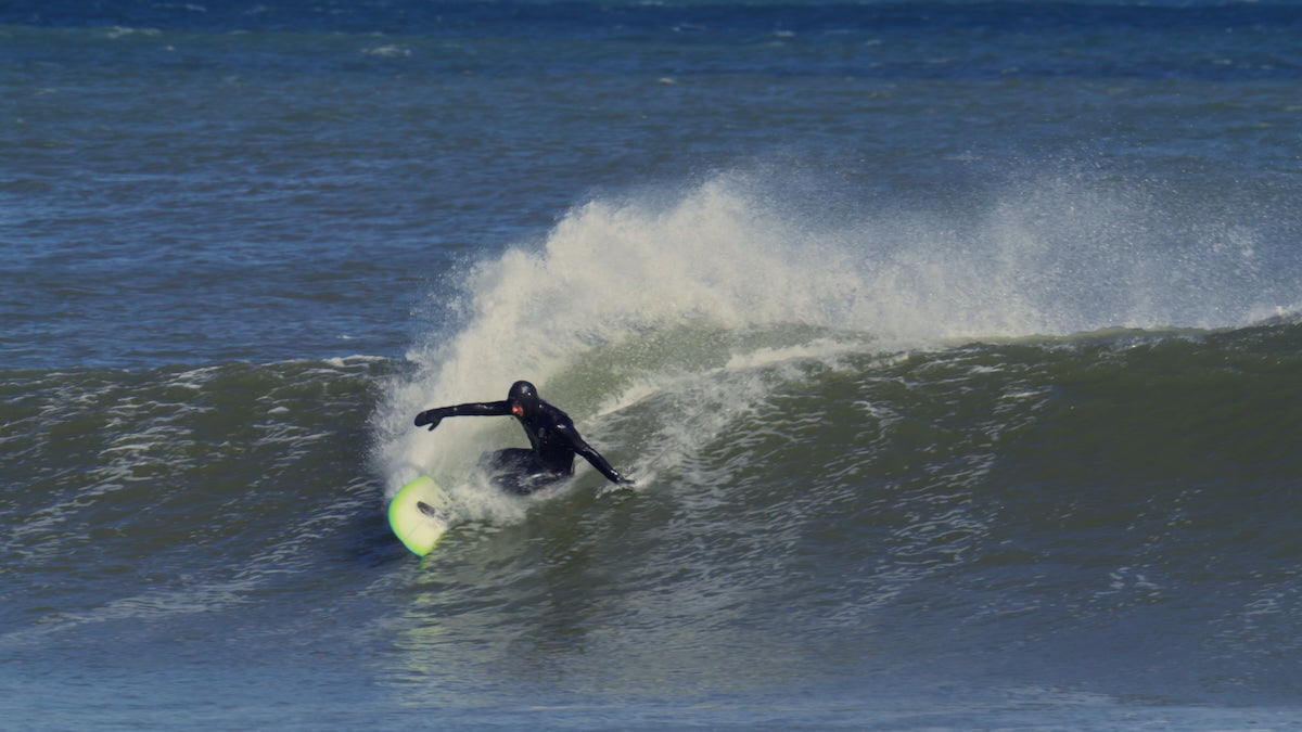 Sammer Hammer carving on a wave