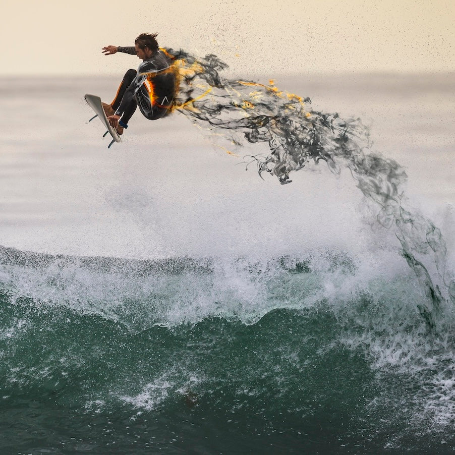 Person surfing on a wave with a blurred background